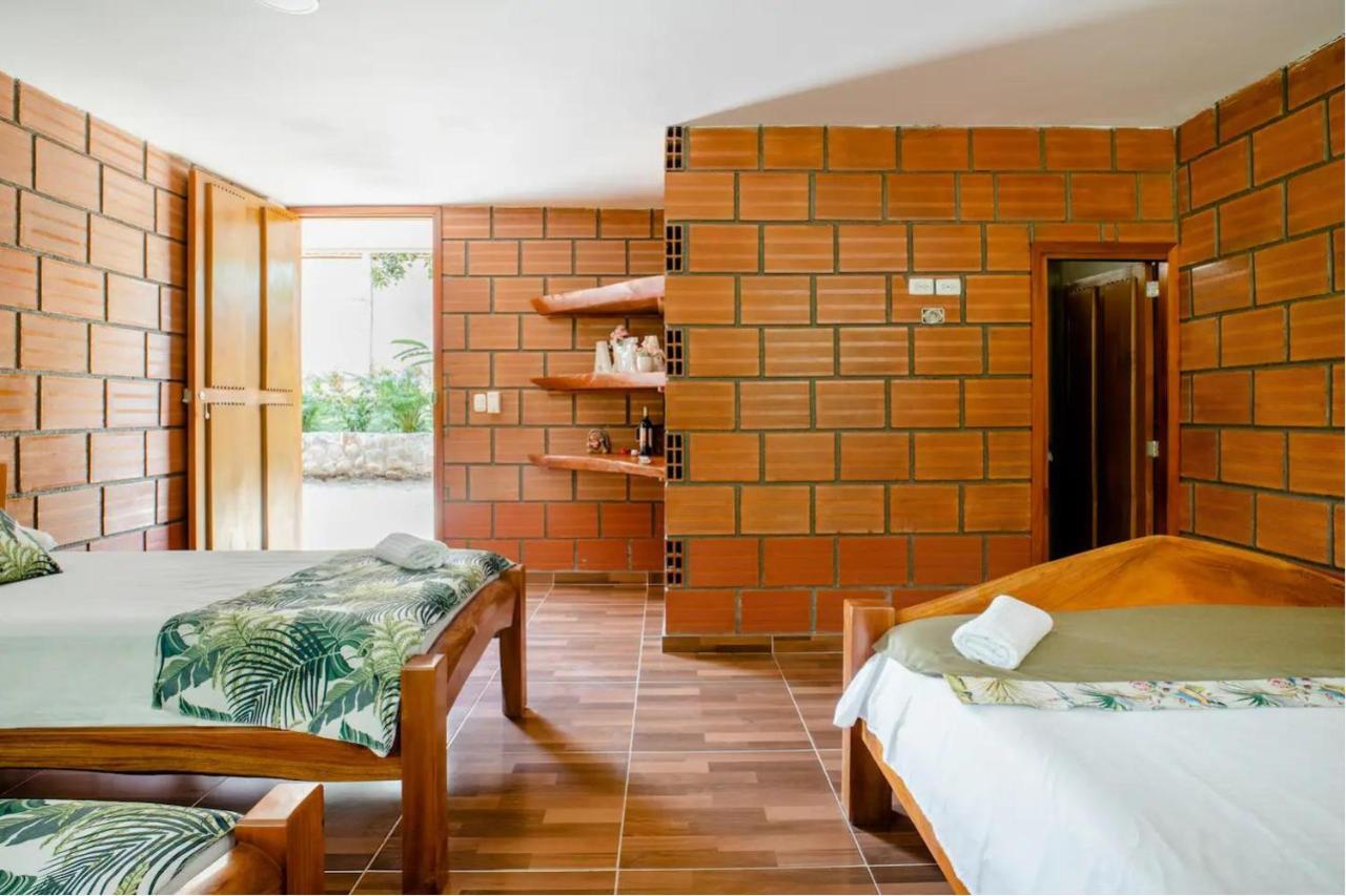 Arca Tayrona Restaurant & Hostal ลอสนารานฆอส ภายนอก รูปภาพ