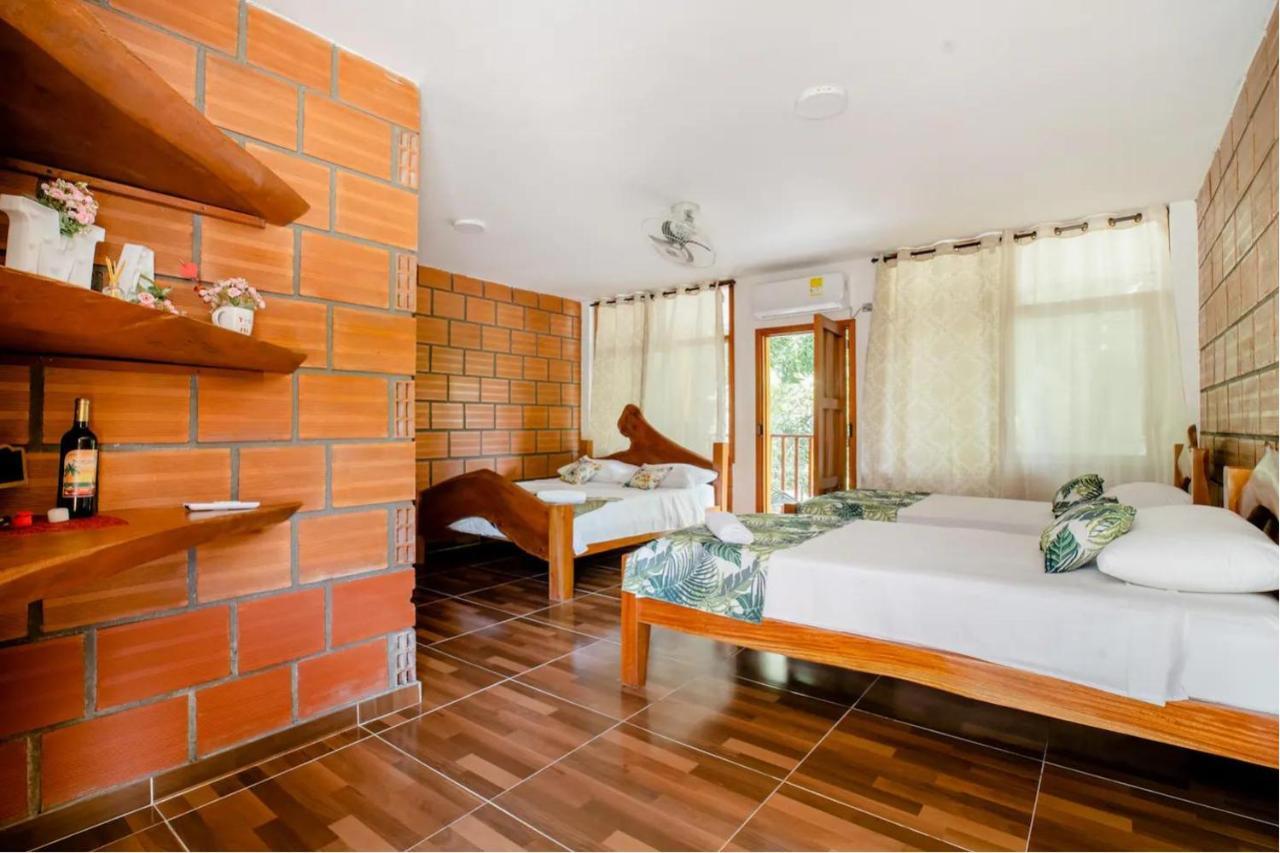 Arca Tayrona Restaurant & Hostal ลอสนารานฆอส ภายนอก รูปภาพ
