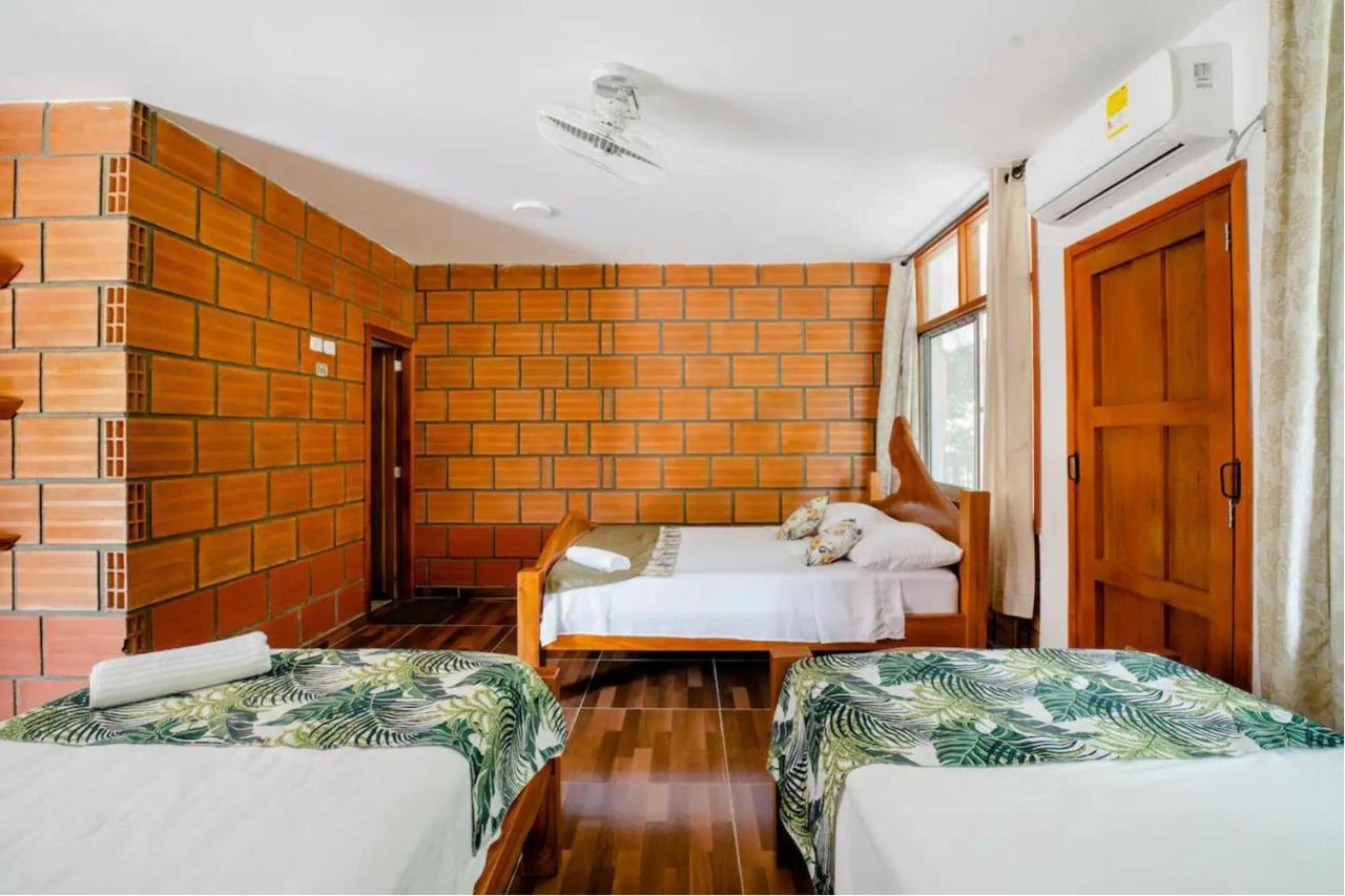 Arca Tayrona Restaurant & Hostal ลอสนารานฆอส ภายนอก รูปภาพ