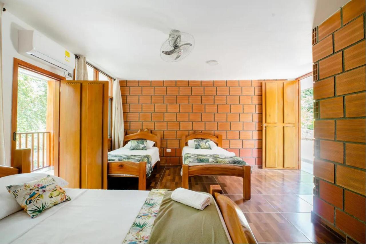 Arca Tayrona Restaurant & Hostal ลอสนารานฆอส ภายนอก รูปภาพ