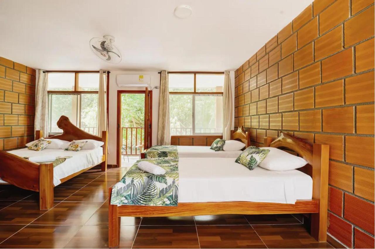 Arca Tayrona Restaurant & Hostal ลอสนารานฆอส ภายนอก รูปภาพ